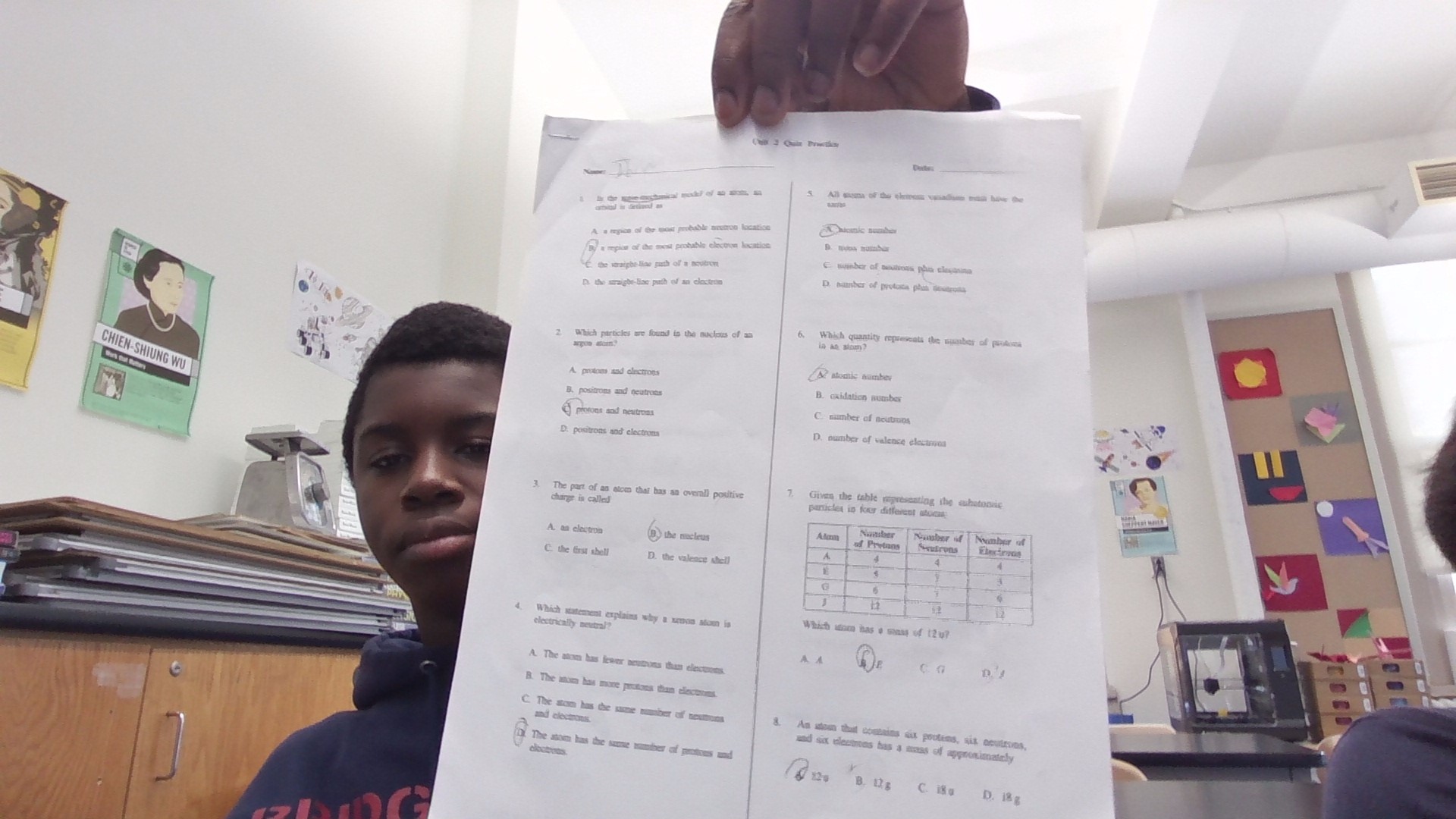 1. In the approximate model of an atom, an | StudyX