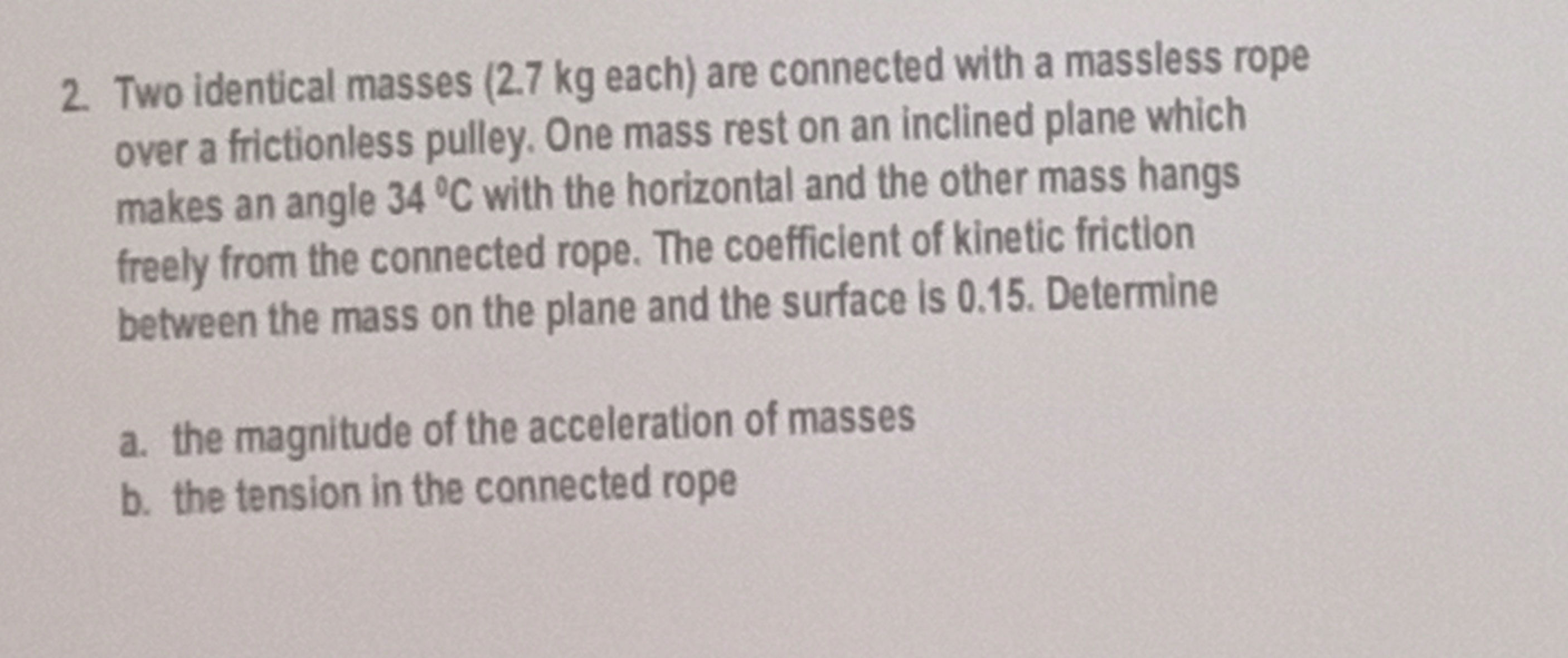 2. Two identical masses (2.7 kg each) are | StudyX