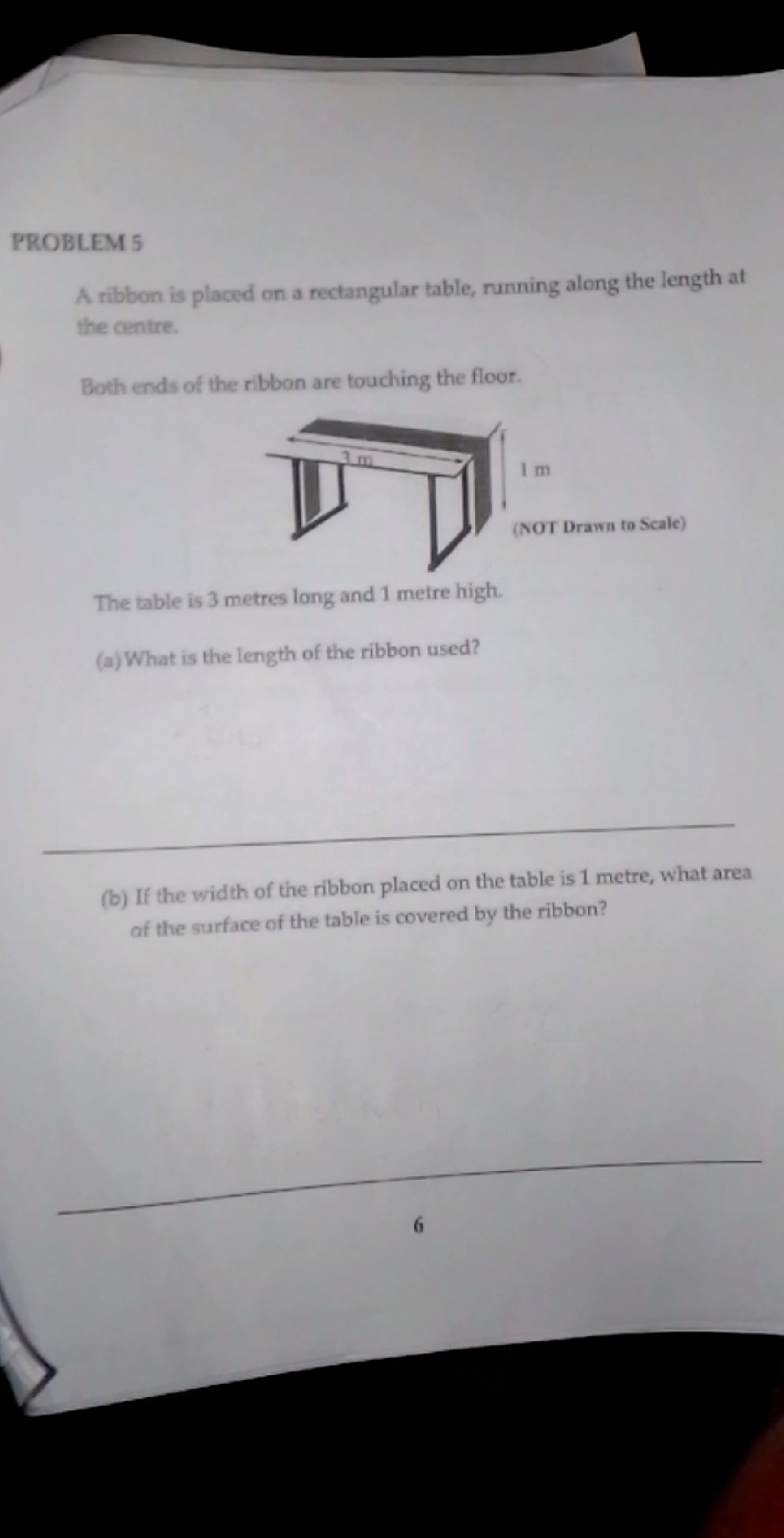 Rectangle Table With Ribbon A ribbon is placed on a rectangular table,