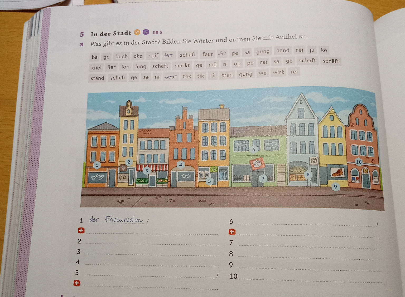 5 In der Stadt WG KB 5 a Was gibt es in der | StudyX