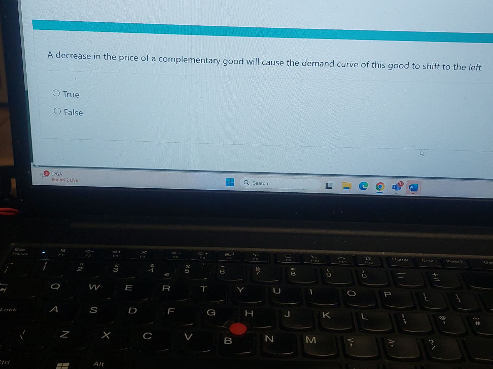 A decrease in the price of a complementary